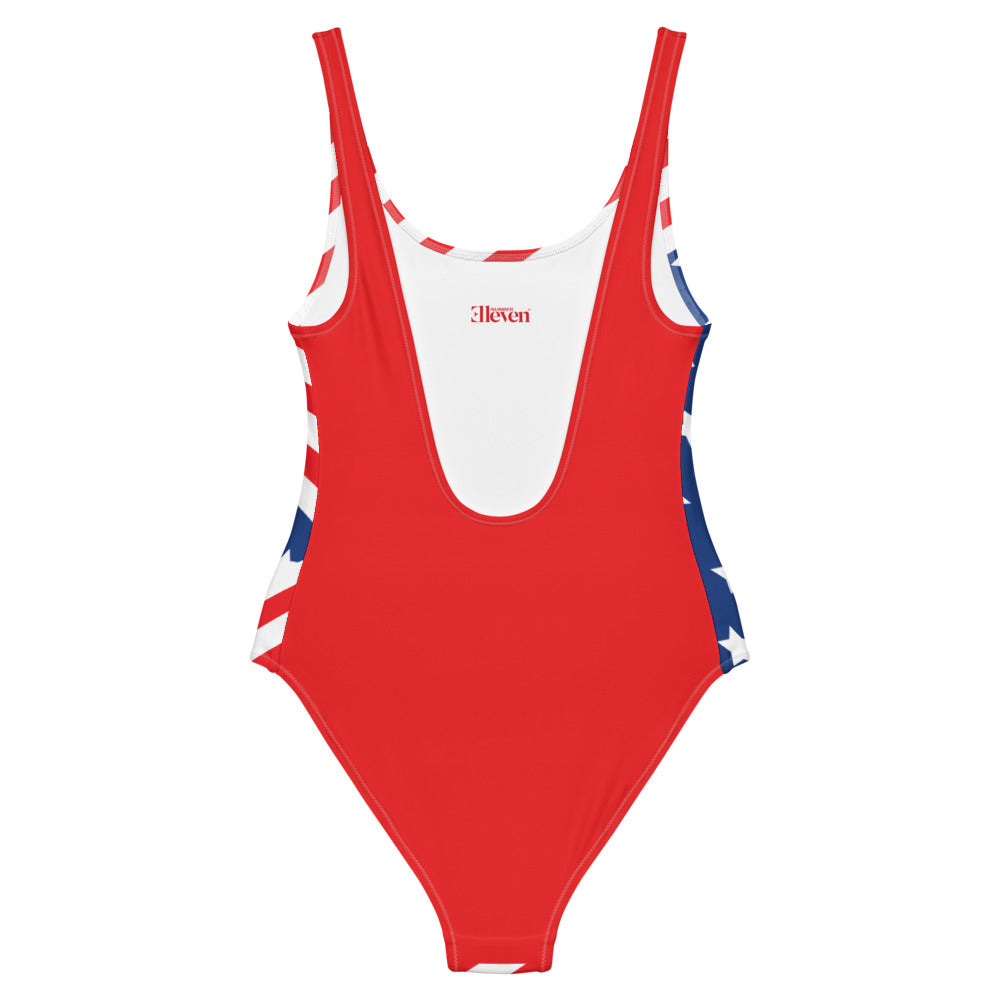Back product view of American stars and stripes one-piece swimsuit with solid red back and low scoop design