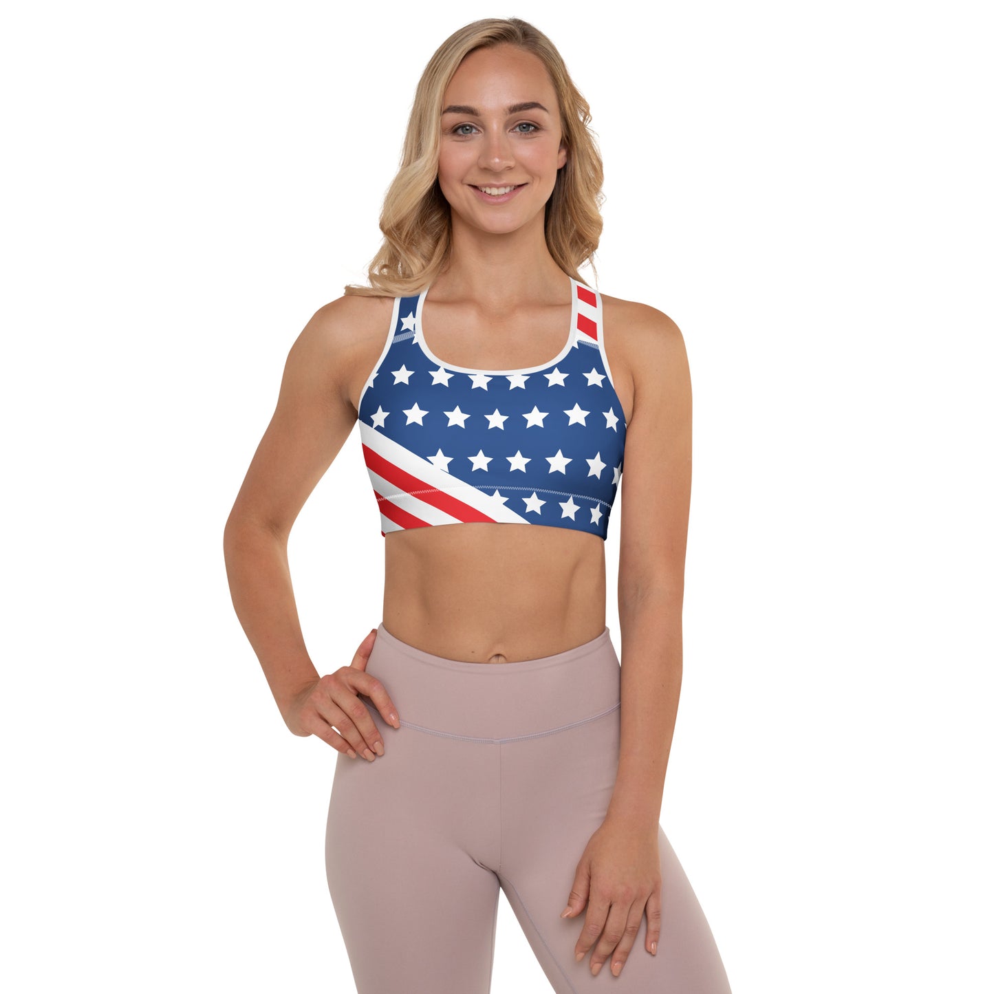 Woman wearing an American stars and stripes padded sports bra in red white and blue front view