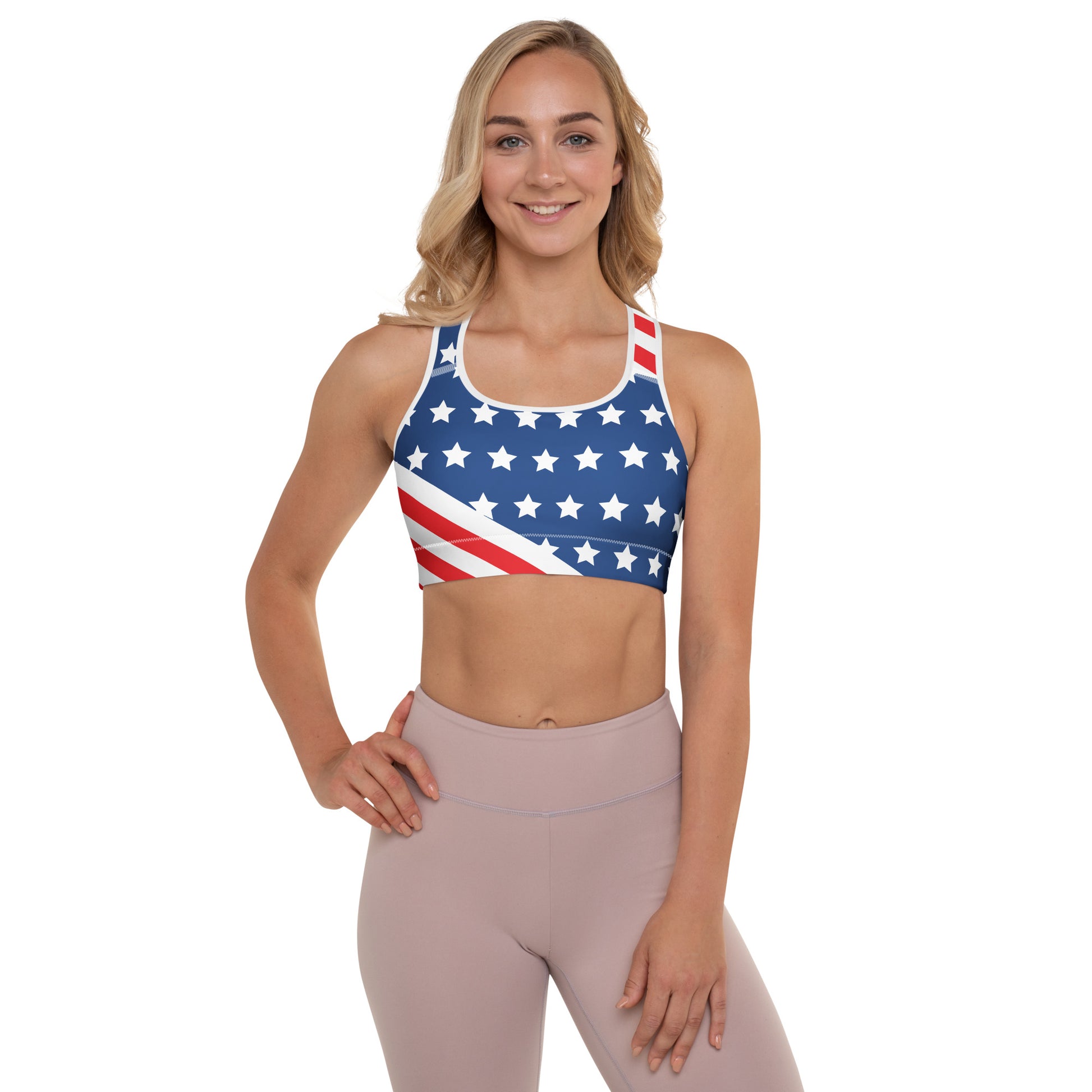 Woman wearing an American stars and stripes padded sports bra in red white and blue front view
