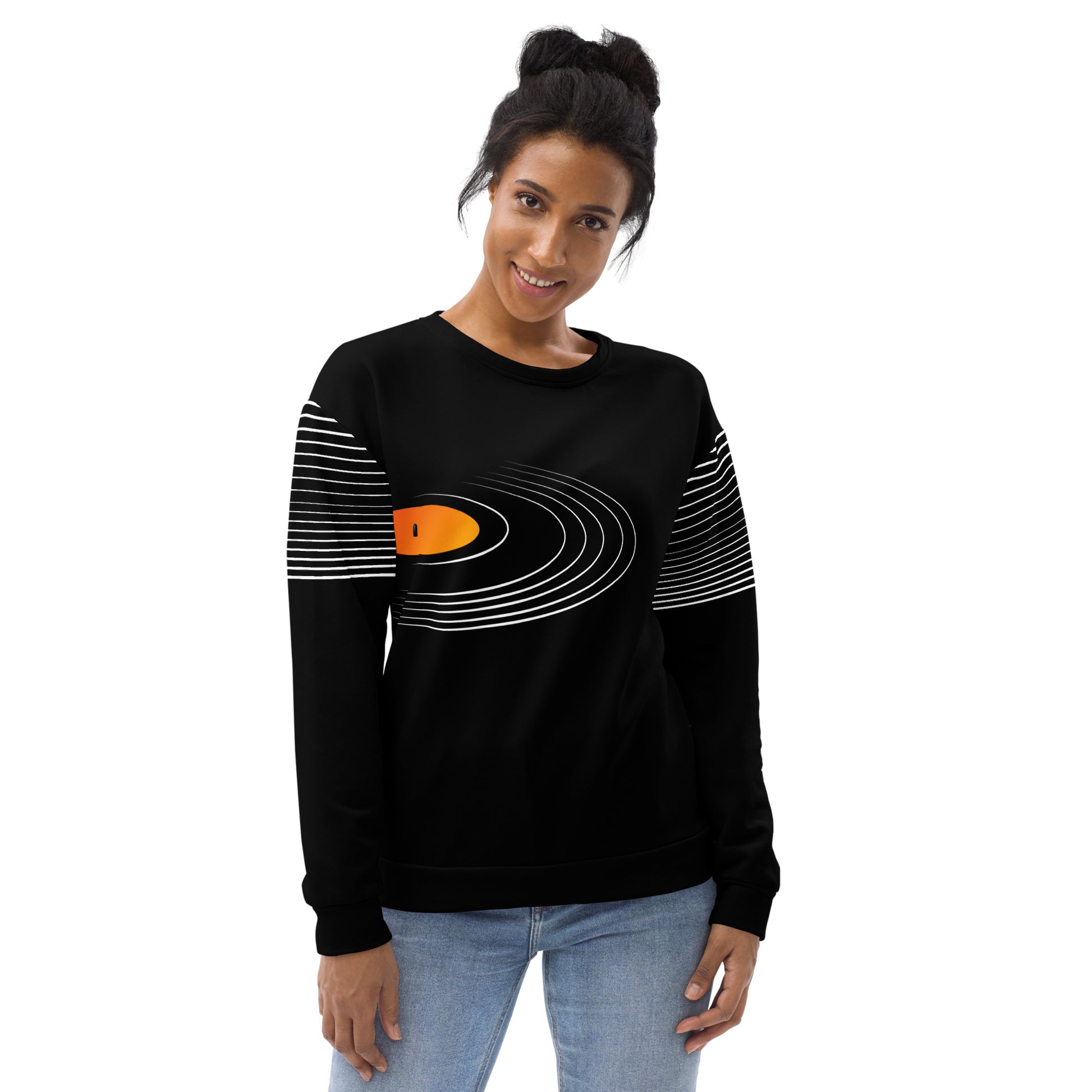 Woman wearing a black vinyl record groove unisex sweatshirt with white line pattern across the chest and sleeves