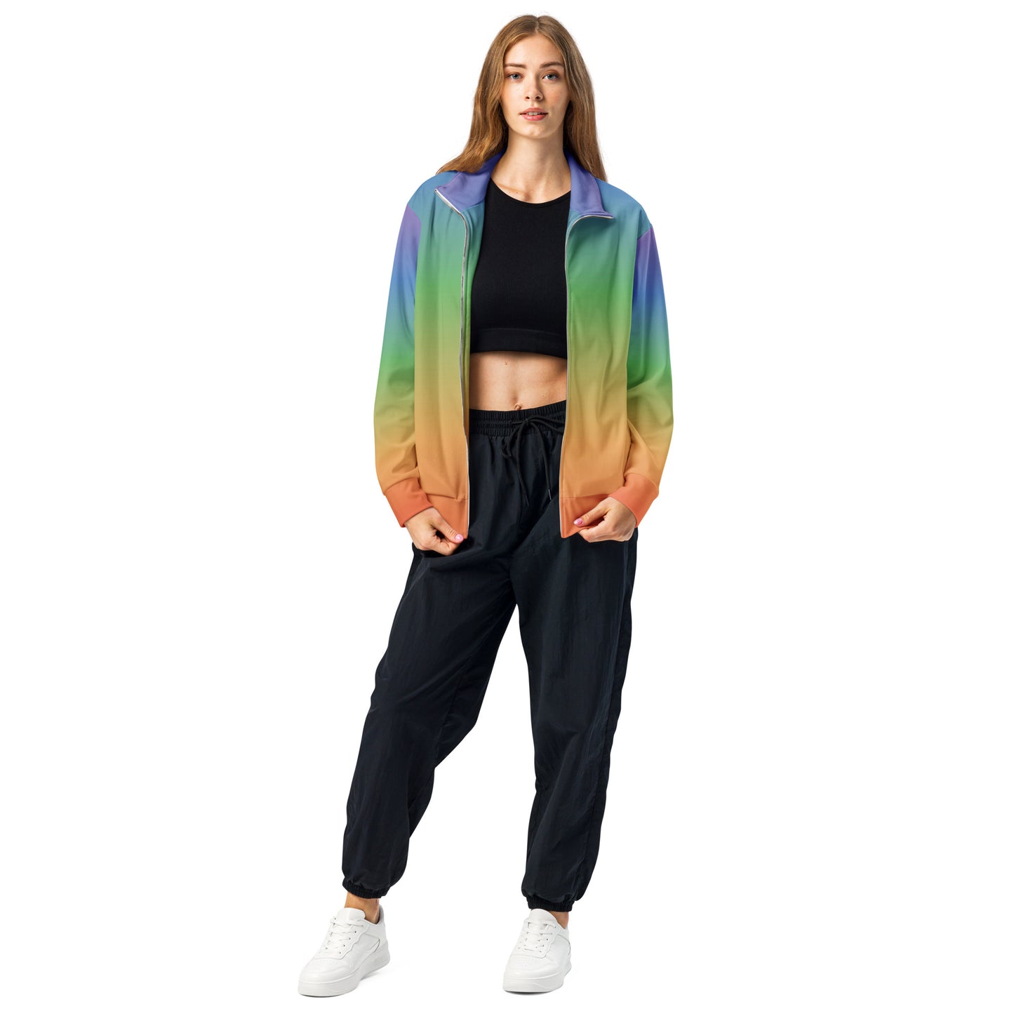 Woman wearing rainbow gradient recycled track jacket on white background