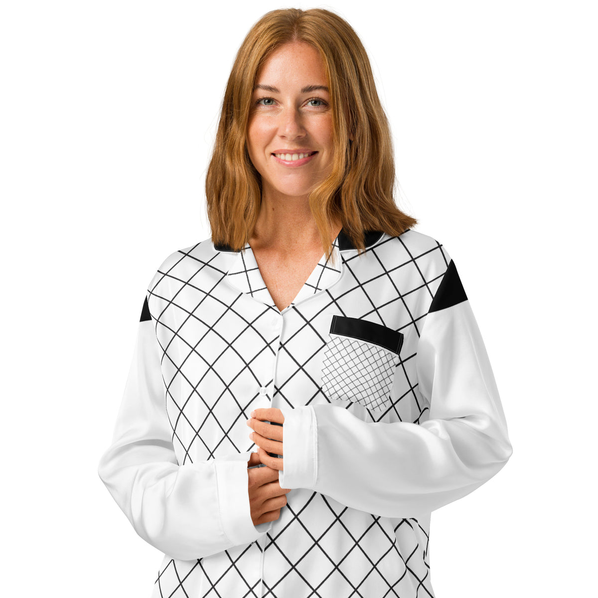 Woman wearing black and white geometric grid women's long sleeve pajama top with chest pocket
