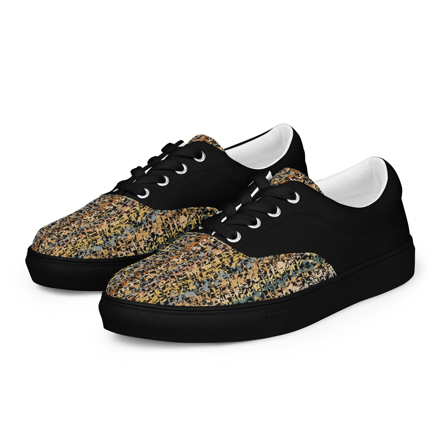 men’s lace-up canvas shoes with black upper and textured beige abstract front panel, lifestyle side view
