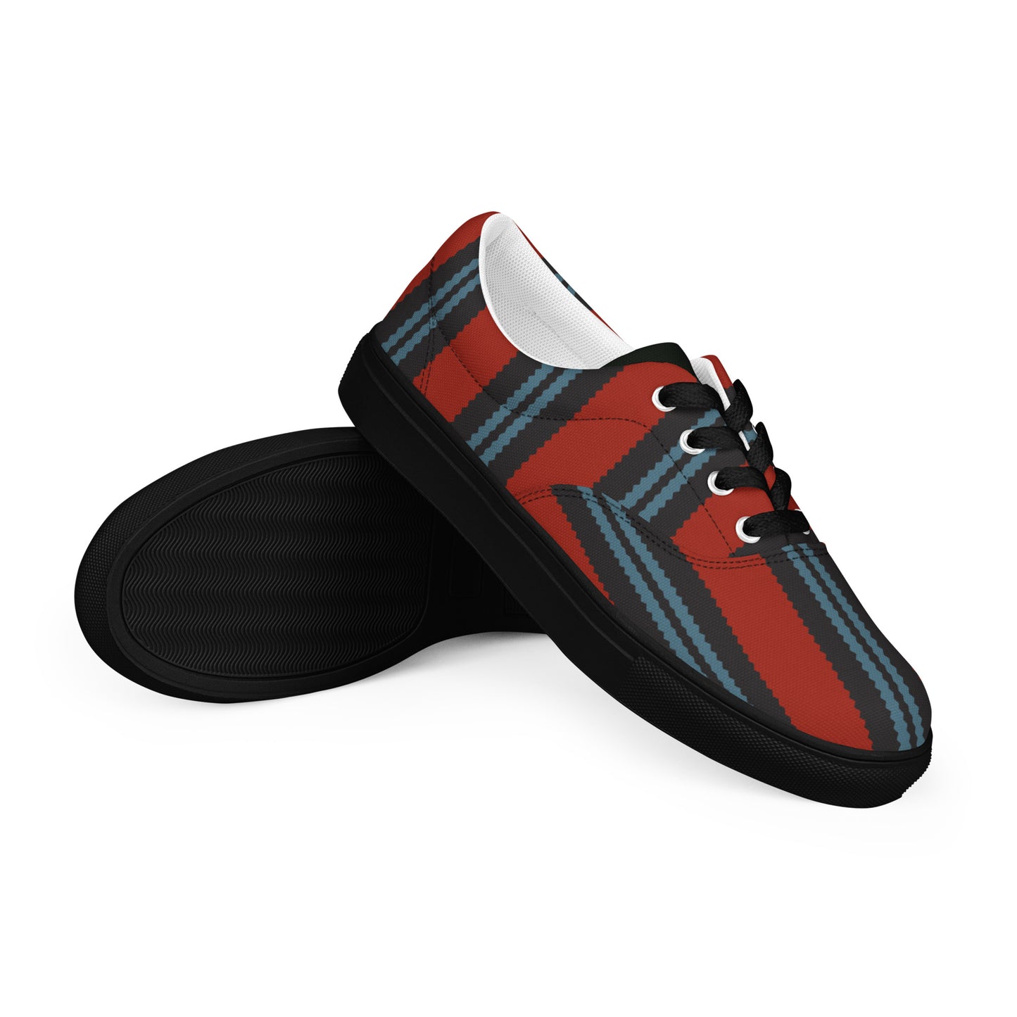 men’s canvas shoes with diagonal striped pattern and black sole on rust red background