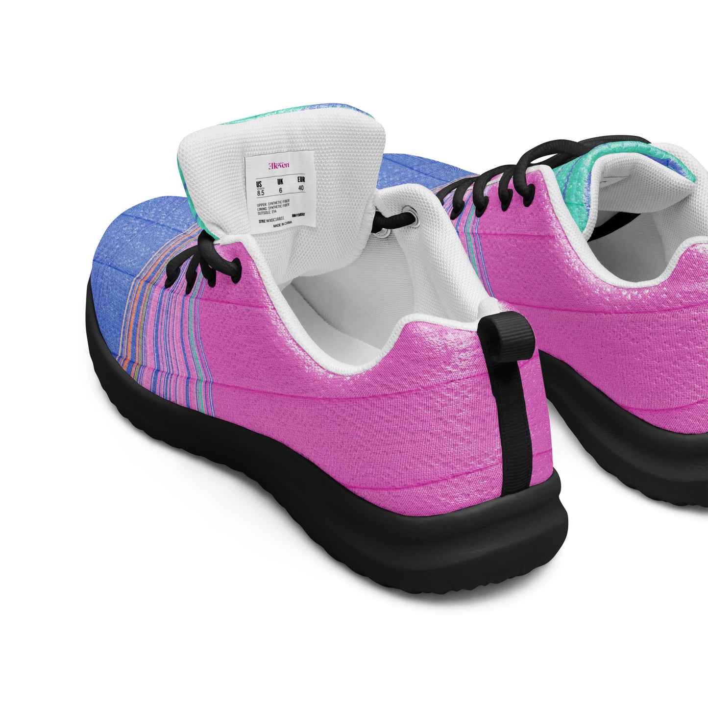 Rear side view of women’s athletic shoes with black sole, bright pink upper, blue heel area, and turquoise accent