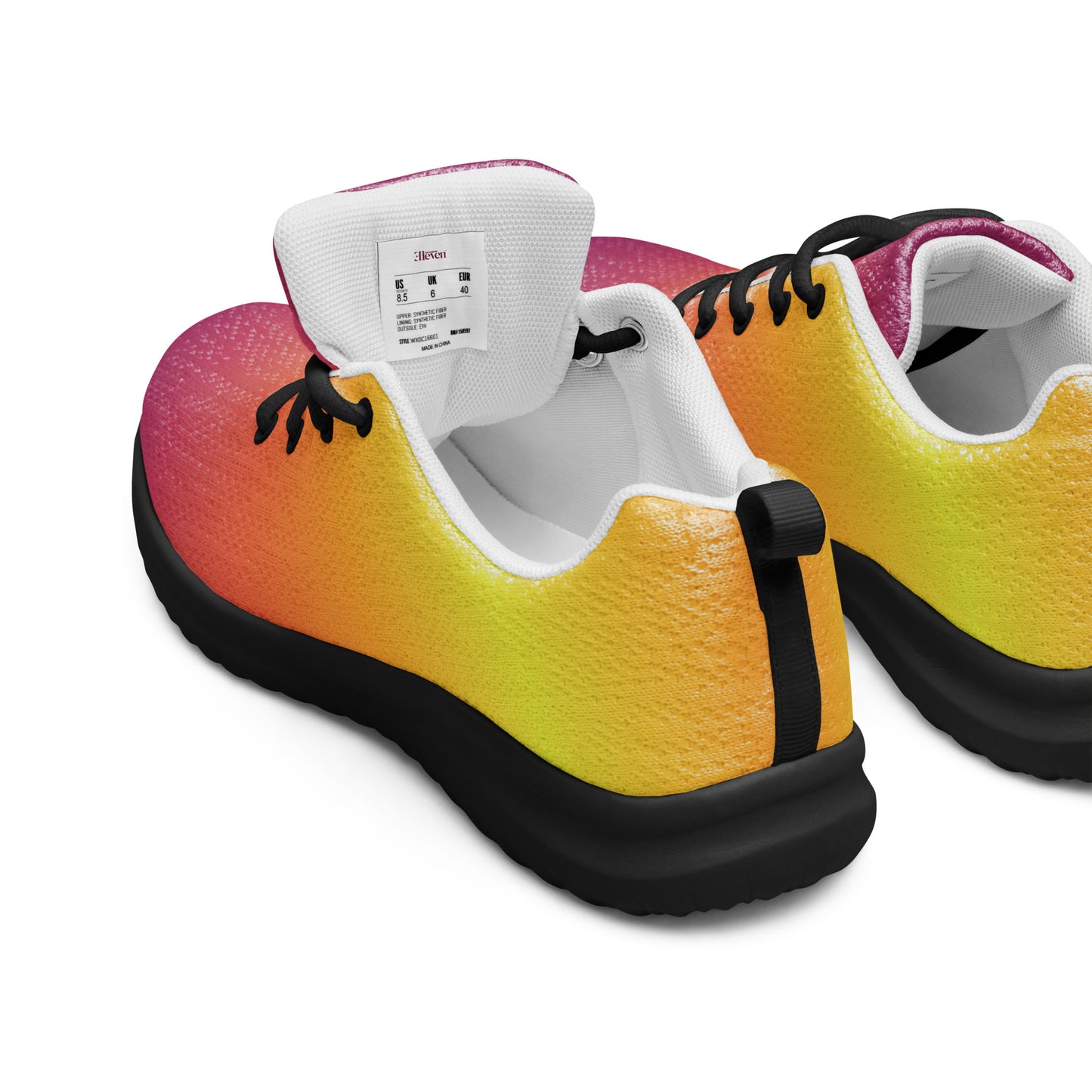 Back view of women’s athletic shoes with yellow, orange, and magenta gradient upper and black sole