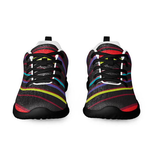 Front view of women’s athletic shoes with black sole and dark textured design with curved red turquoise lime and purple stripes