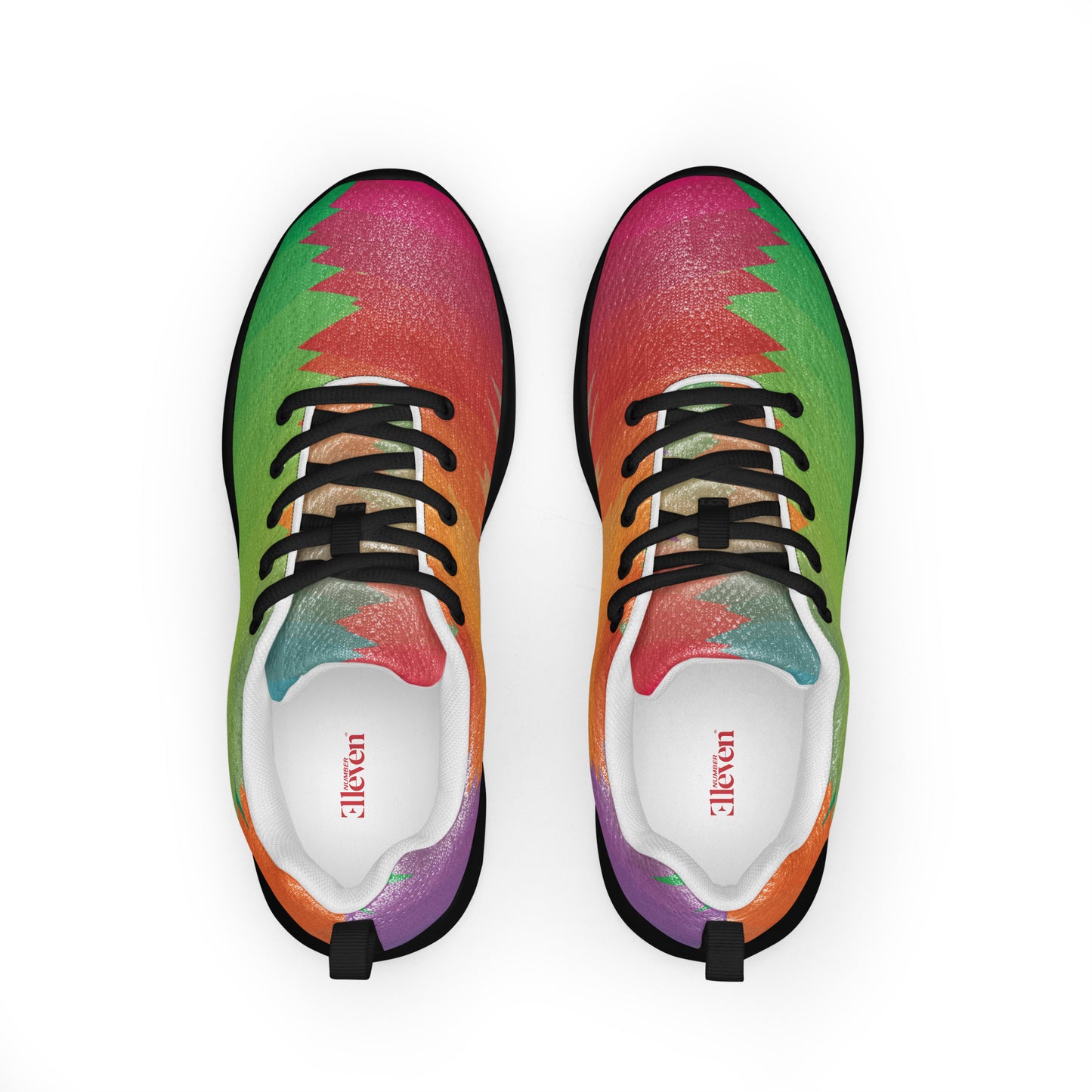 Top view of women’s athletic shoes with black laces and bold tropical color block pattern