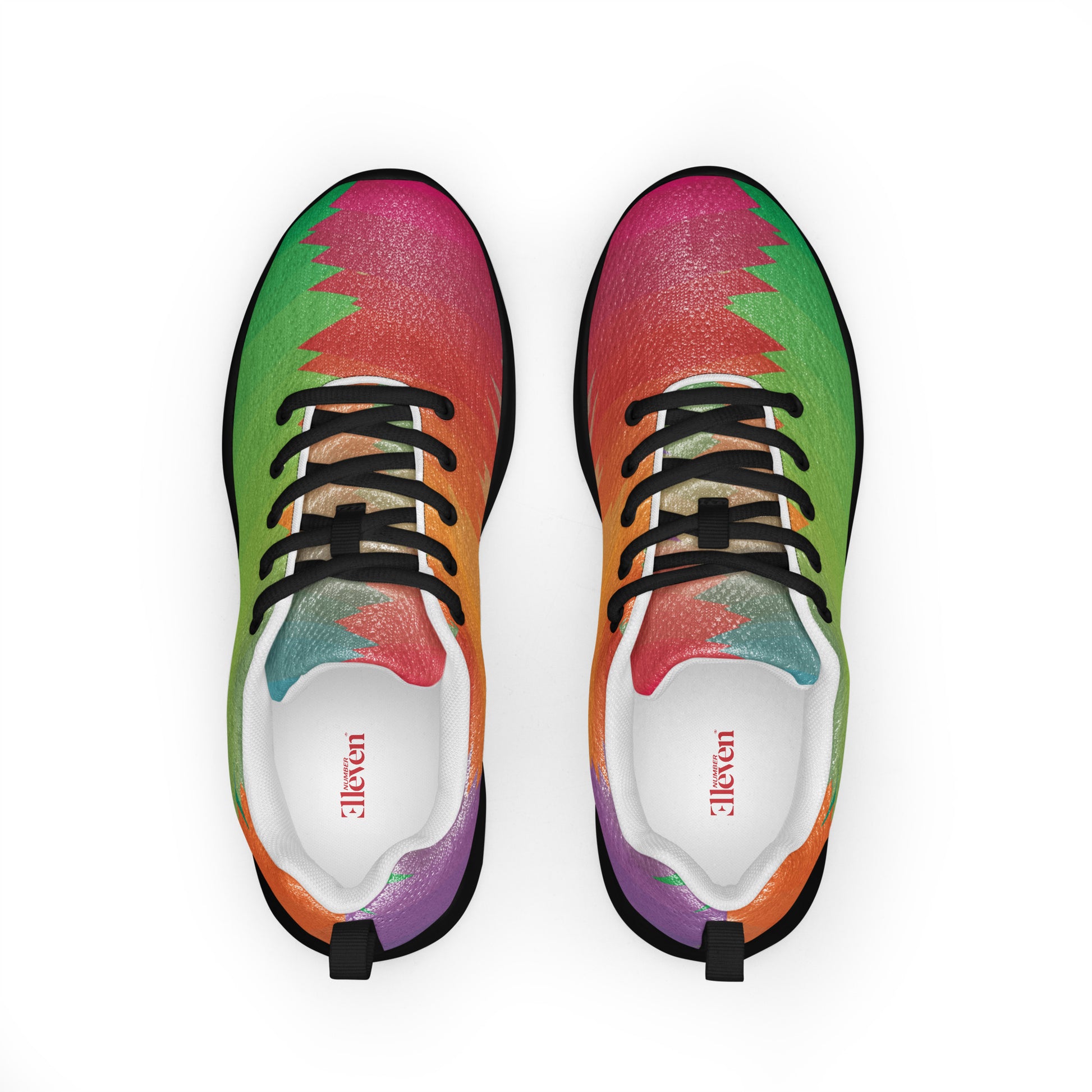 Top view of women’s athletic shoes with black laces and bold tropical color block pattern
