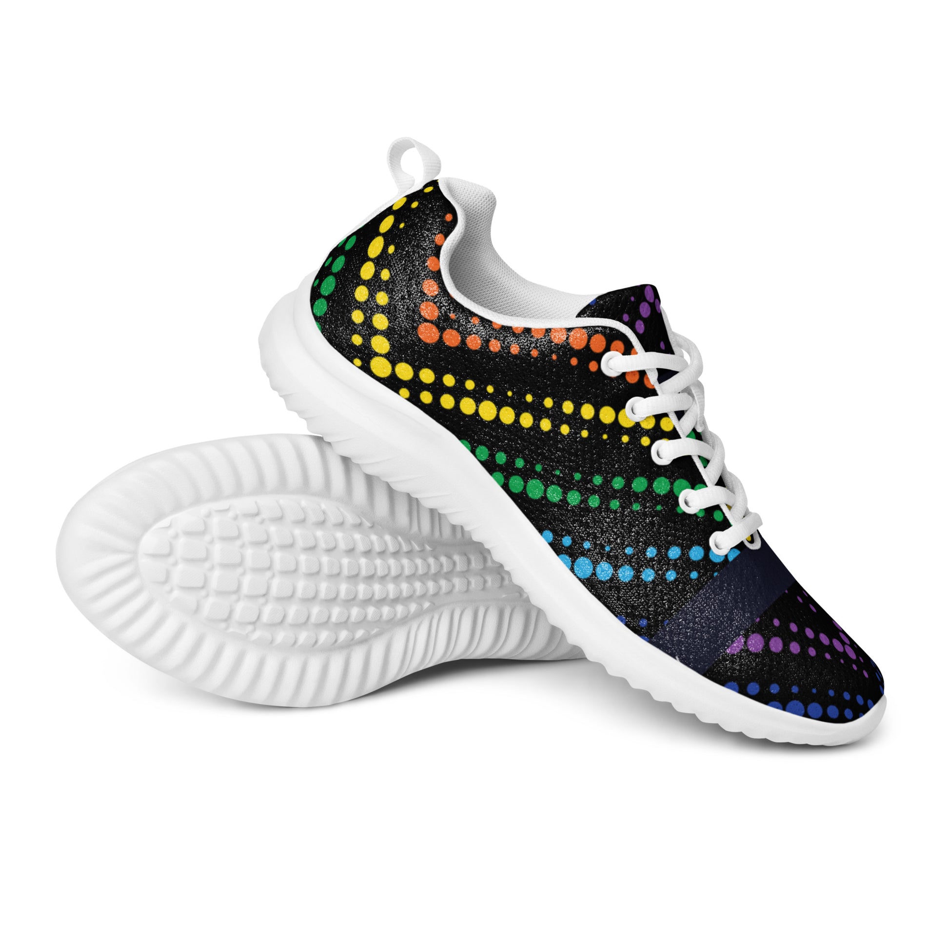 Women’s athletic shoes with white sole and white laces in a black design with curved rainbow dot lines, angled pair view