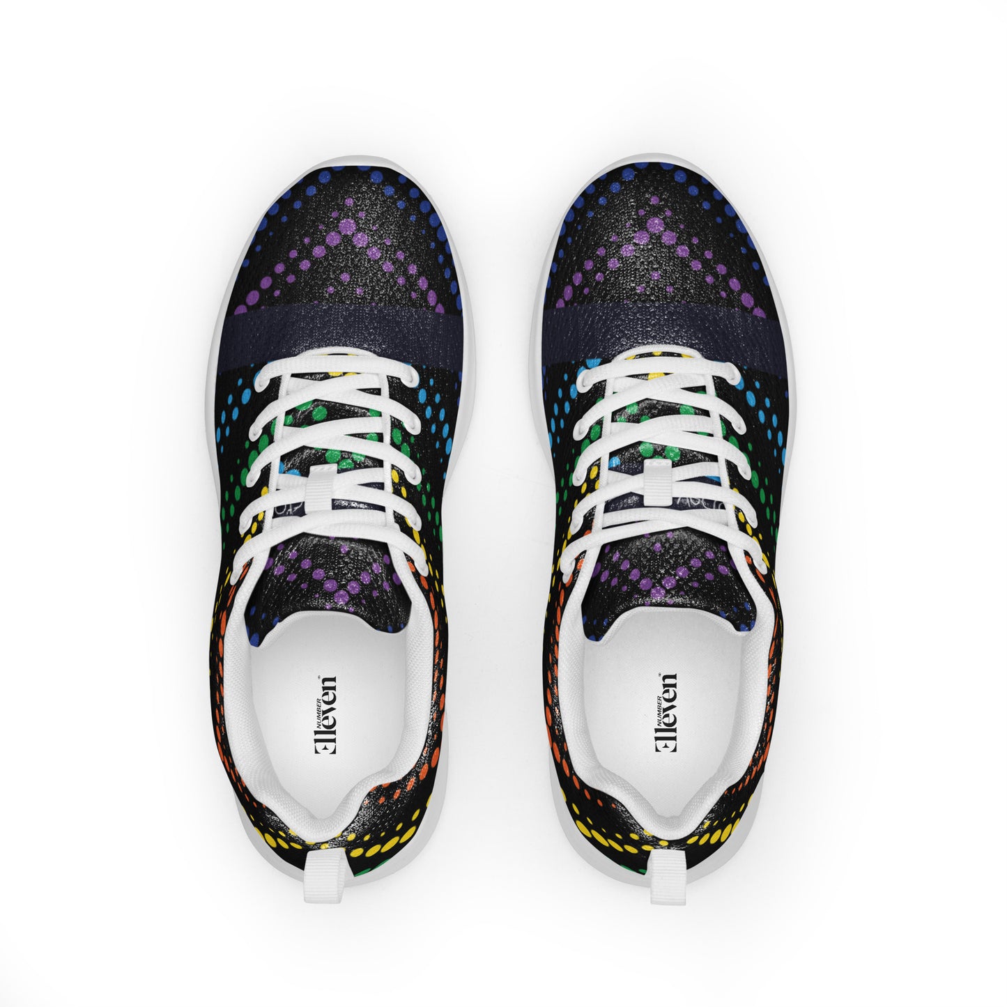 Top view of women’s athletic shoes featuring rainbow dot bands on black with white laces