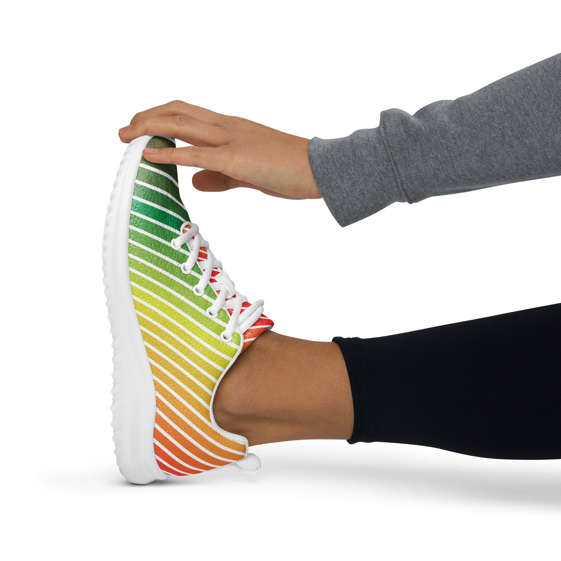 women’s athletic shoes with white sole and colorful wave stripe pattern in green yellow orange and red