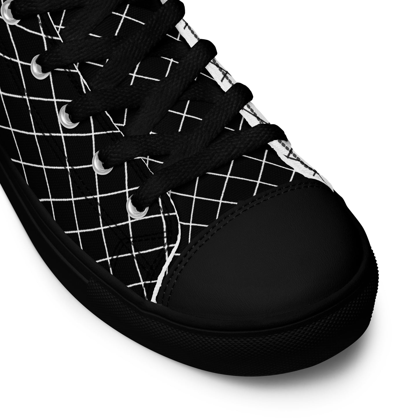 Close-up of women's black geometric grid high-top sneaker with black laces and black toe cap