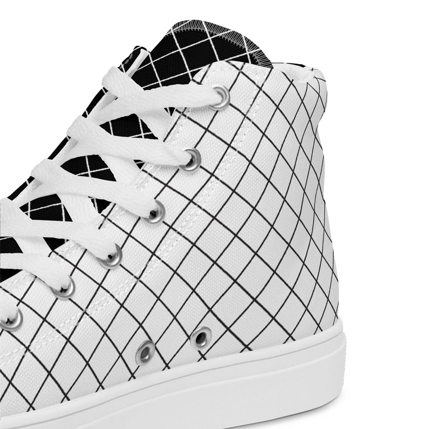 Close-up of women's white geometric grid high-top sneaker with black line pattern and white laces
