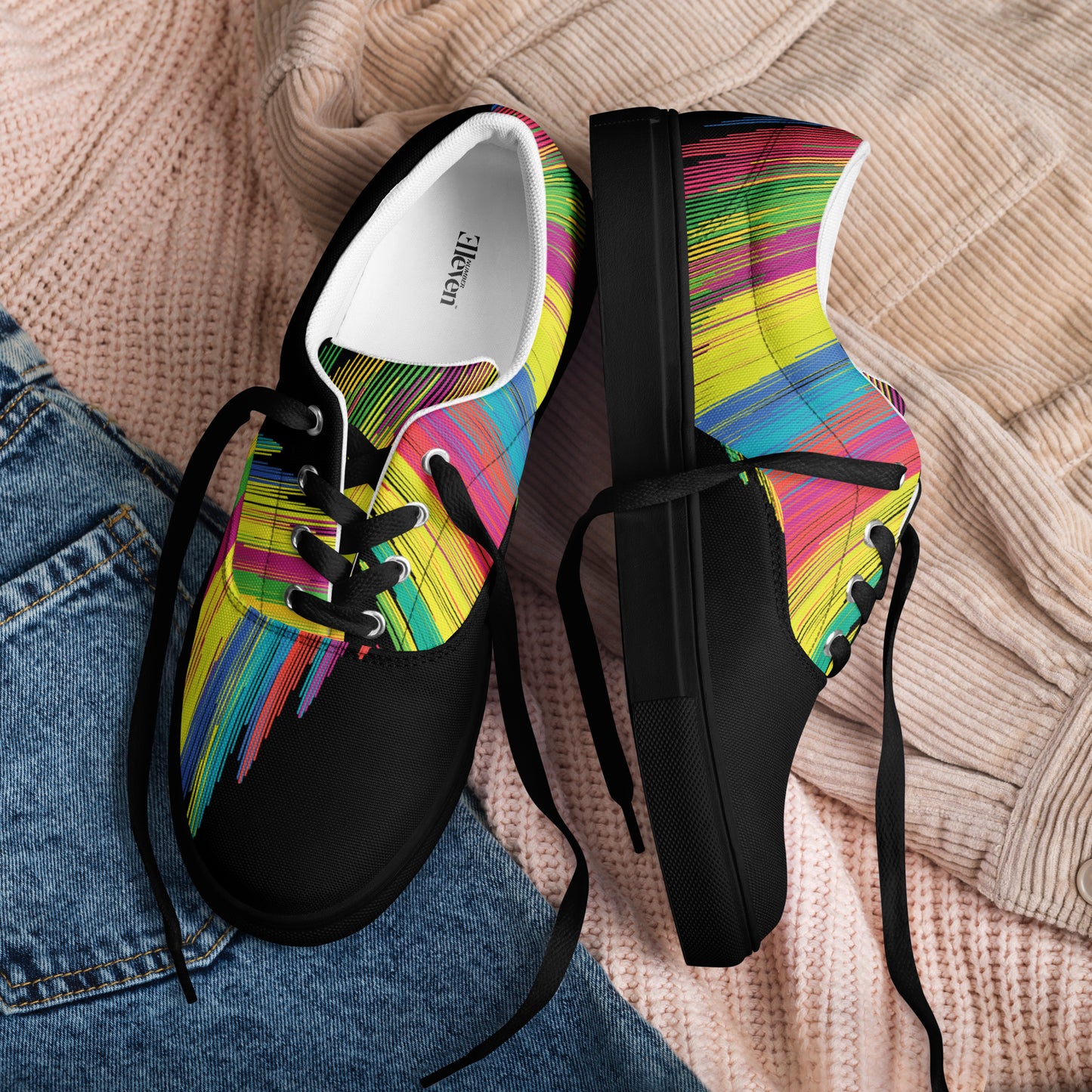 Alt text — slika 4
abstract multicolor women’s lace-up fashion sneakers with painterly stripe details on black upper