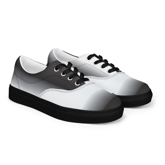 Women’s lace-up canvas shoes with monochrome gradient design,
black laces, and black sole