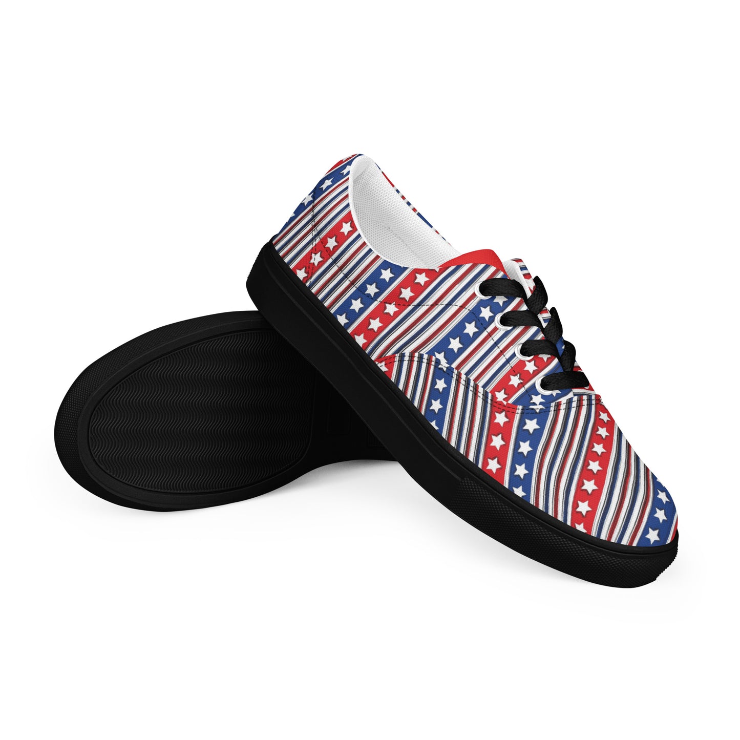 Side angled view of American star stripe women's lace-up canvas shoes with black sole and repeating stars-and-stripes pattern