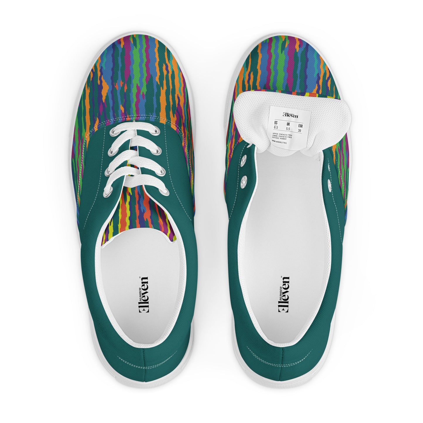 Top view of women’s lace-up canvas shoes with teal upper and vibrant multicolor wave pattern across the toe