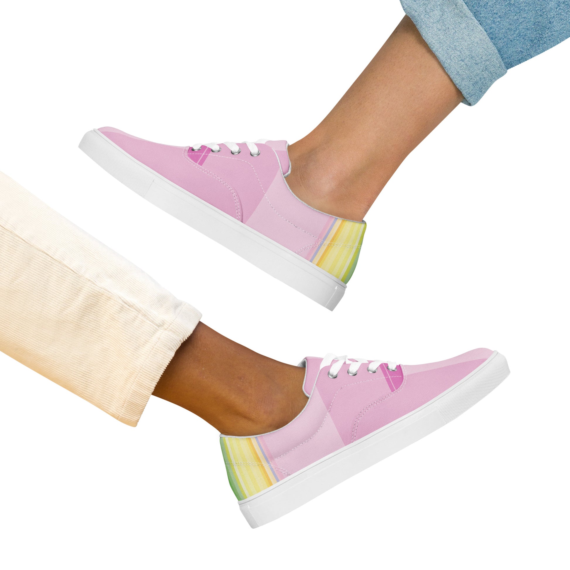 women’s lace-up canvas shoes featuring a minimal pastel stripe pattern on a light pink base
