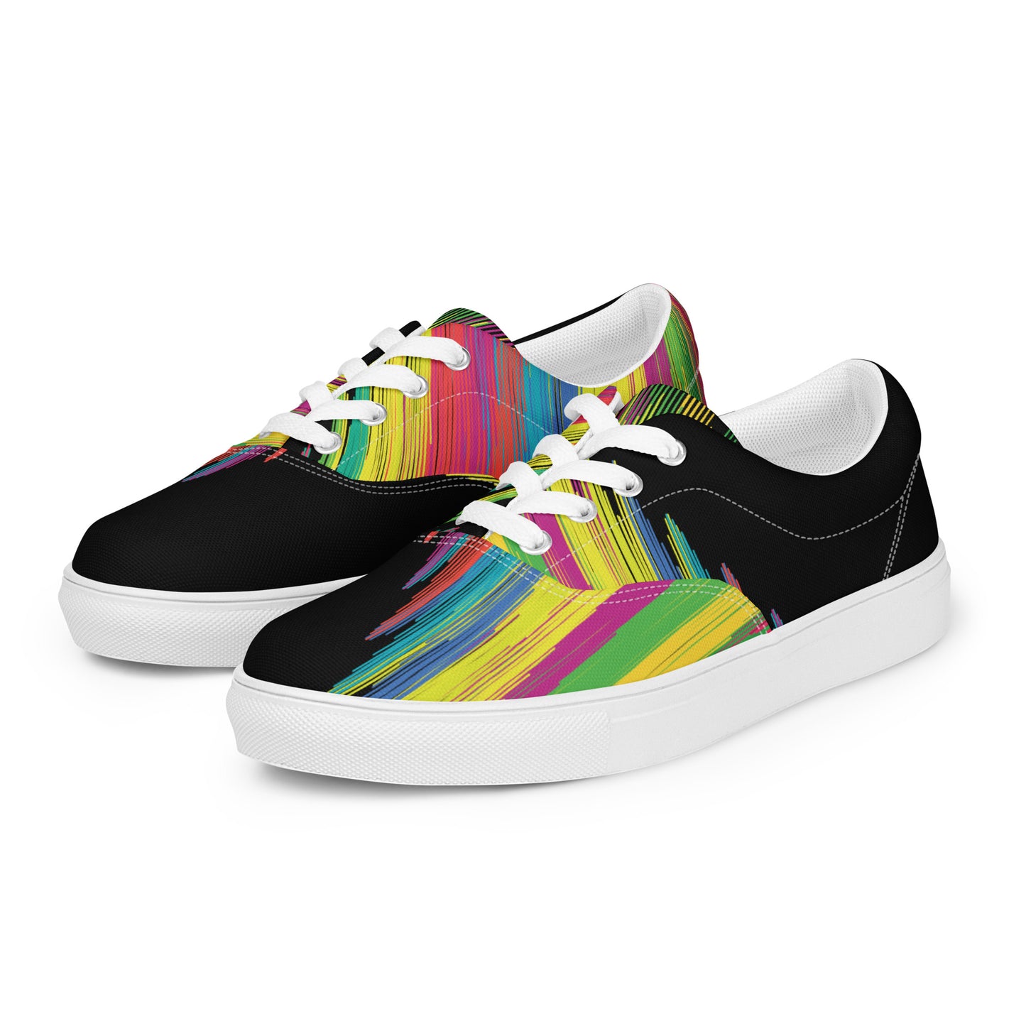 Alt text — slika 2
women’s lace-up canvas shoes with colorful paint-stroke pattern on black background, white sole angled pair view