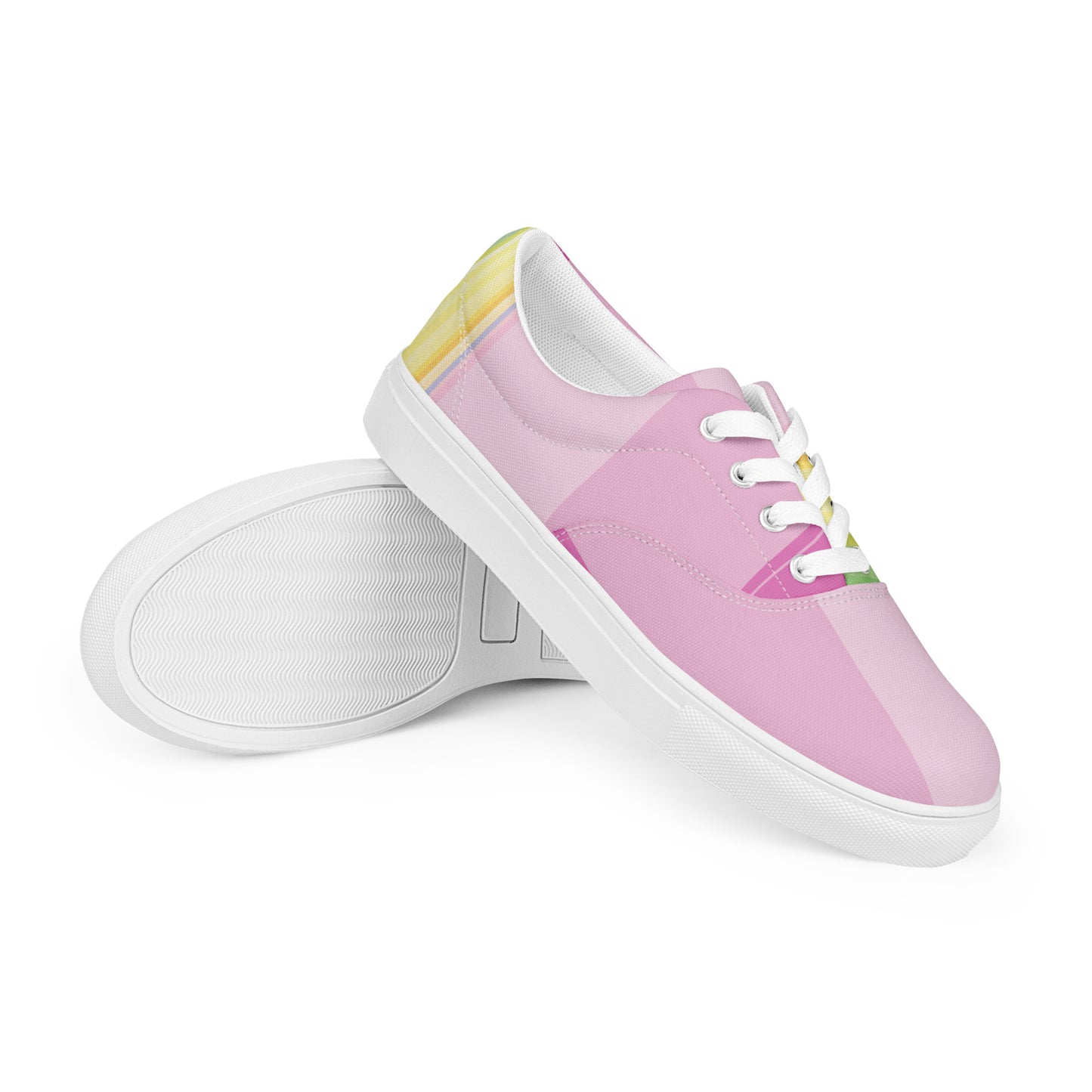 women’s lace-up canvas shoes with blush pink upper and pastel stripe accent shown in white sole pair