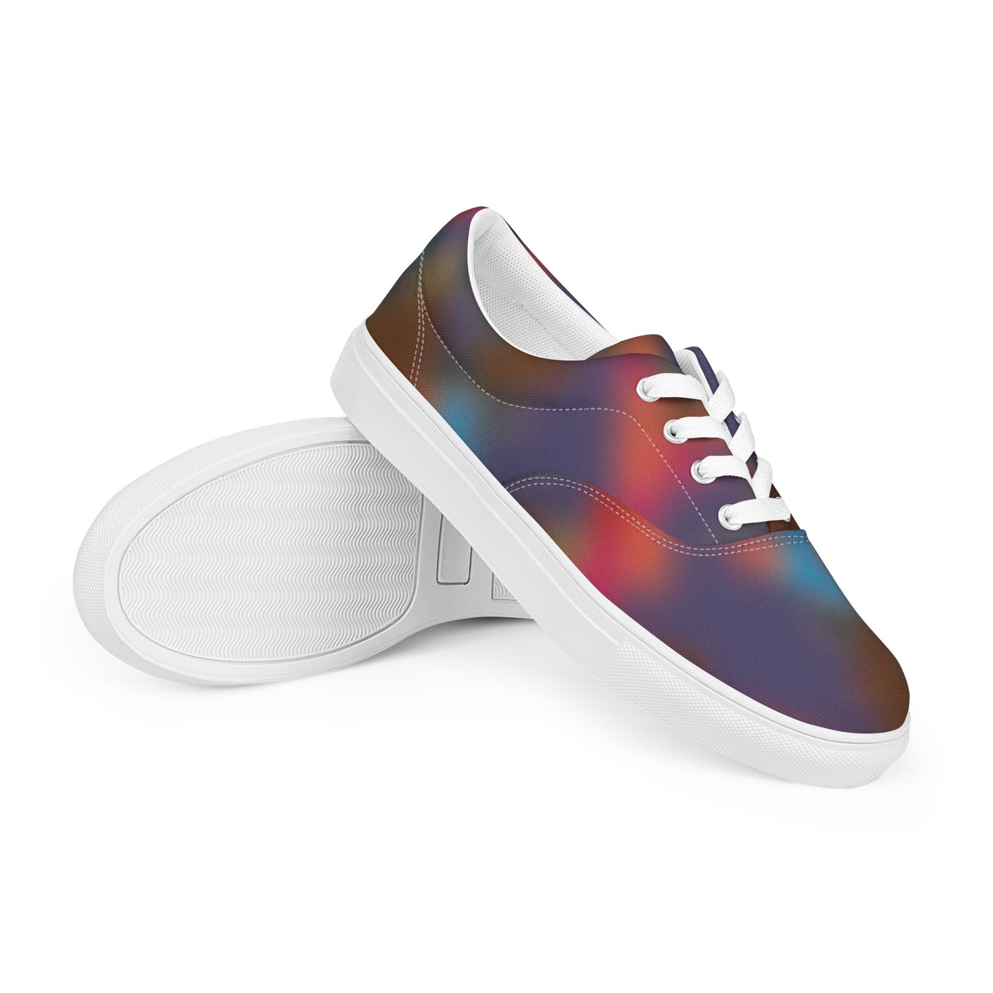 Women’s lace-up canvas shoe with white sole and white laces featuring a soft blurred multicolor design in purple brown blue and red