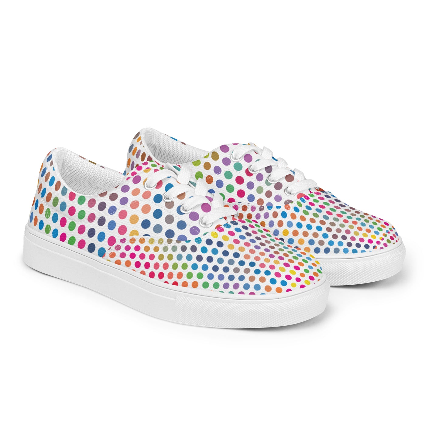 Women’s lace-up canvas shoes with white sole and colorful polka dot pattern on a white base