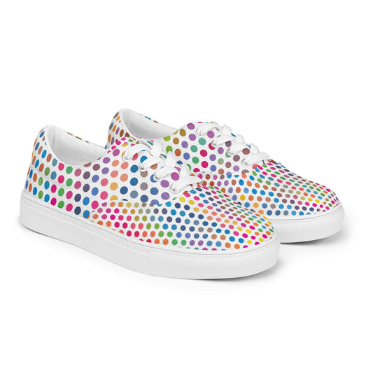 Women’s lace-up canvas shoes with white sole and colorful polka dot pattern on a white base