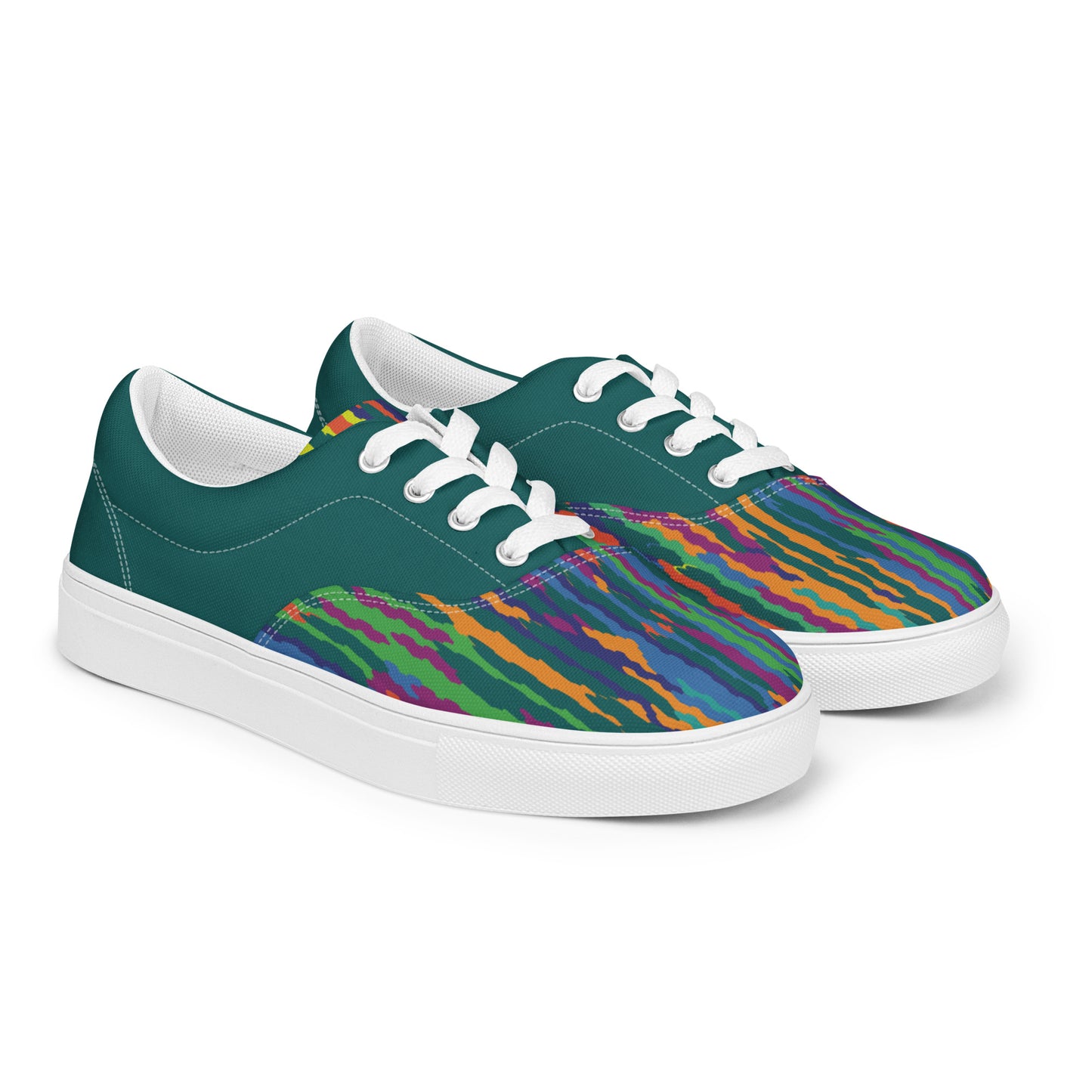 Women’s lace-up canvas shoes with dark teal body, colorful striped toe section, white laces, and white sole